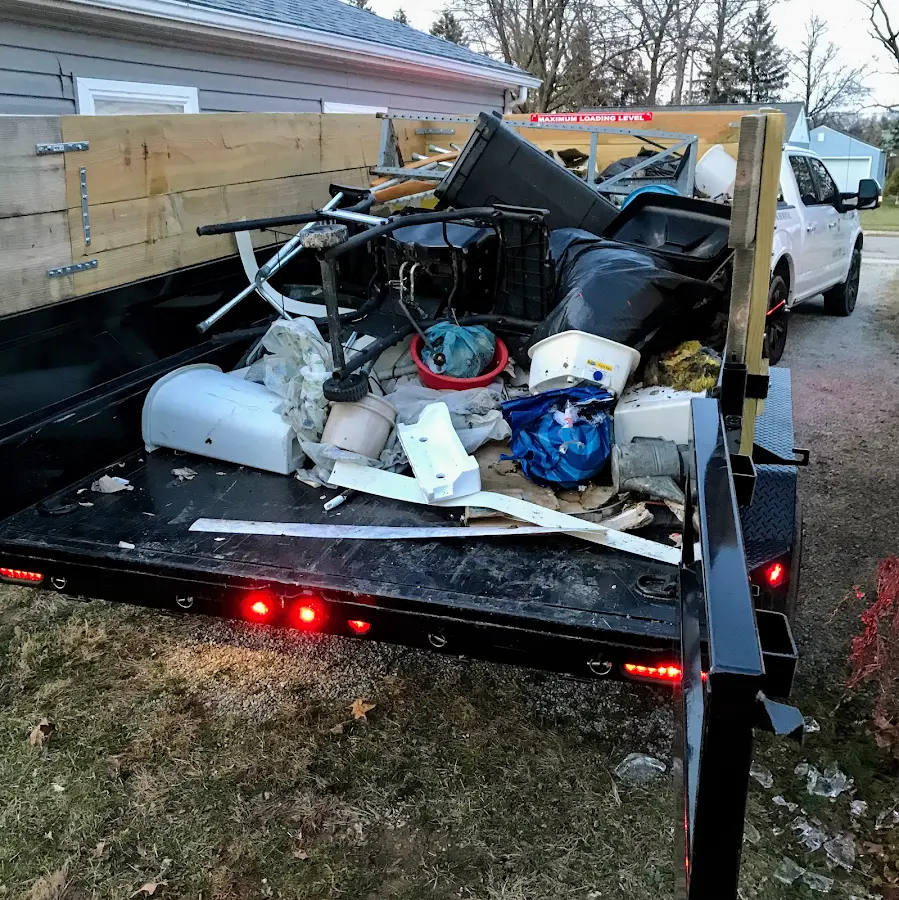 Roll-off dumpster delivered to a residential driveway in Charles City